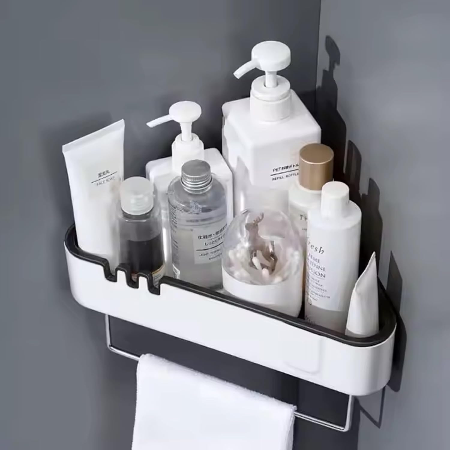 Corner shelf with various toiletries against a gray wall