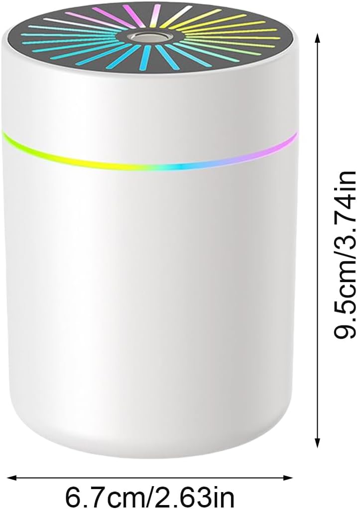 A white cylindrical device with a black top panel featuring a multicolor radial pattern, shown with dimension labels indicating 6.7 cm width and 9.