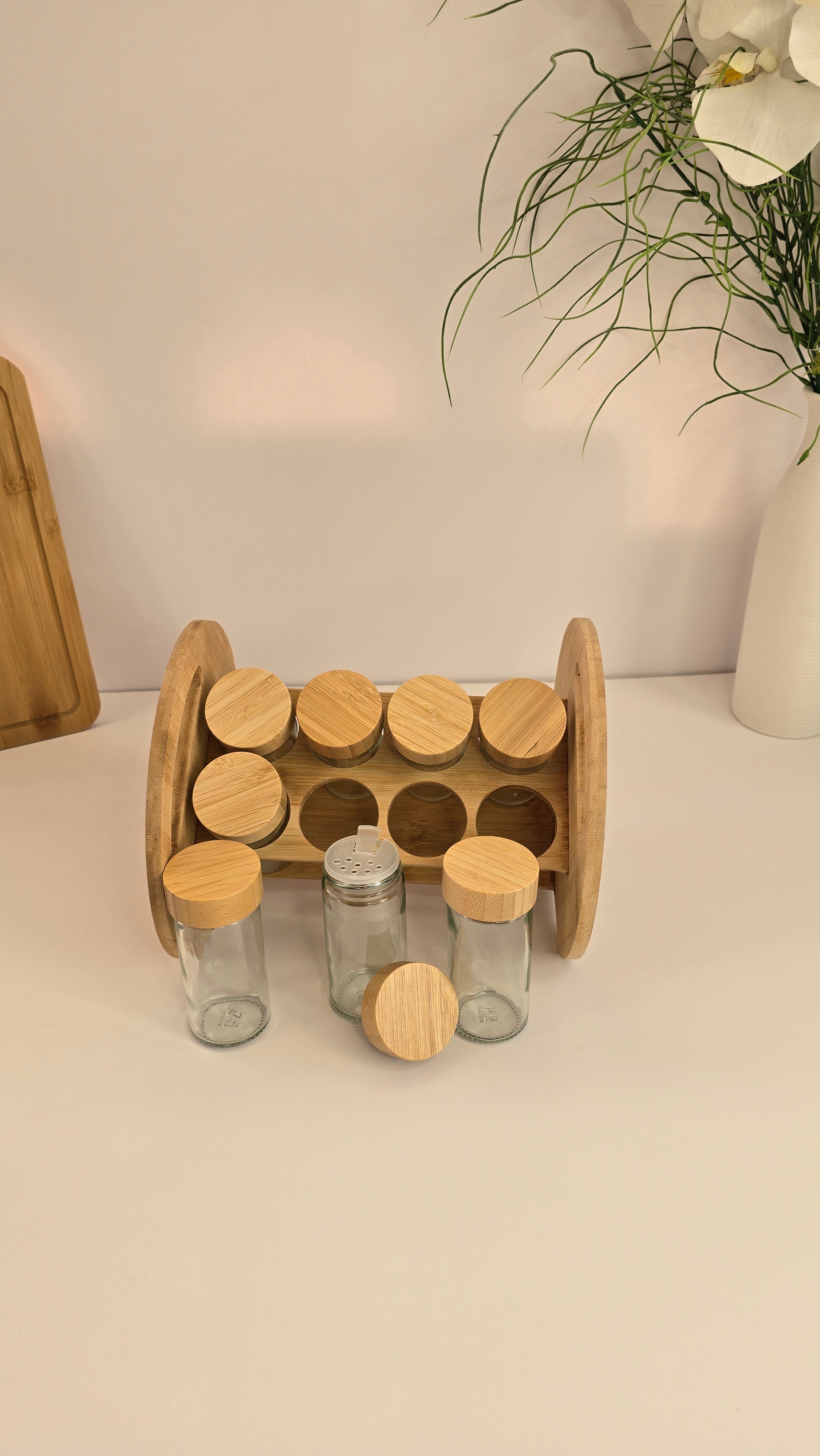 Eight-jar bamboo spice rack with removable shaker inserts and lids