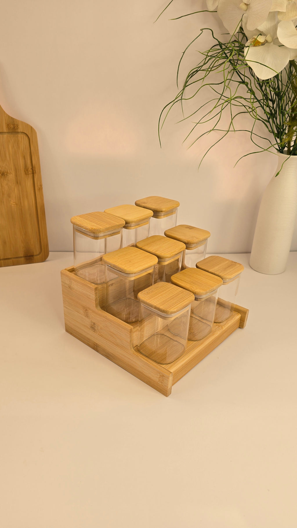 Rear angled view of the bamboo spice rack and removable glass jars