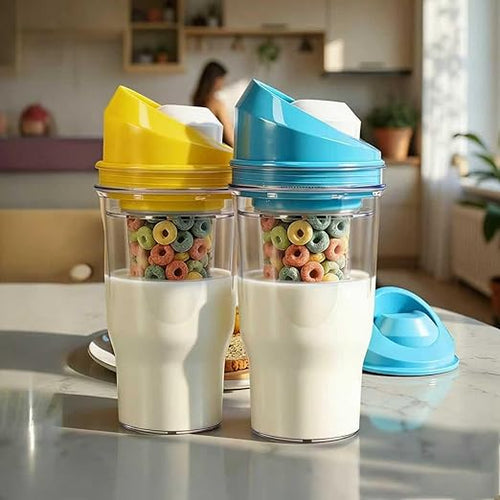 Two colorful cereal dispensers with cereal and milk on a kitchen counter.
