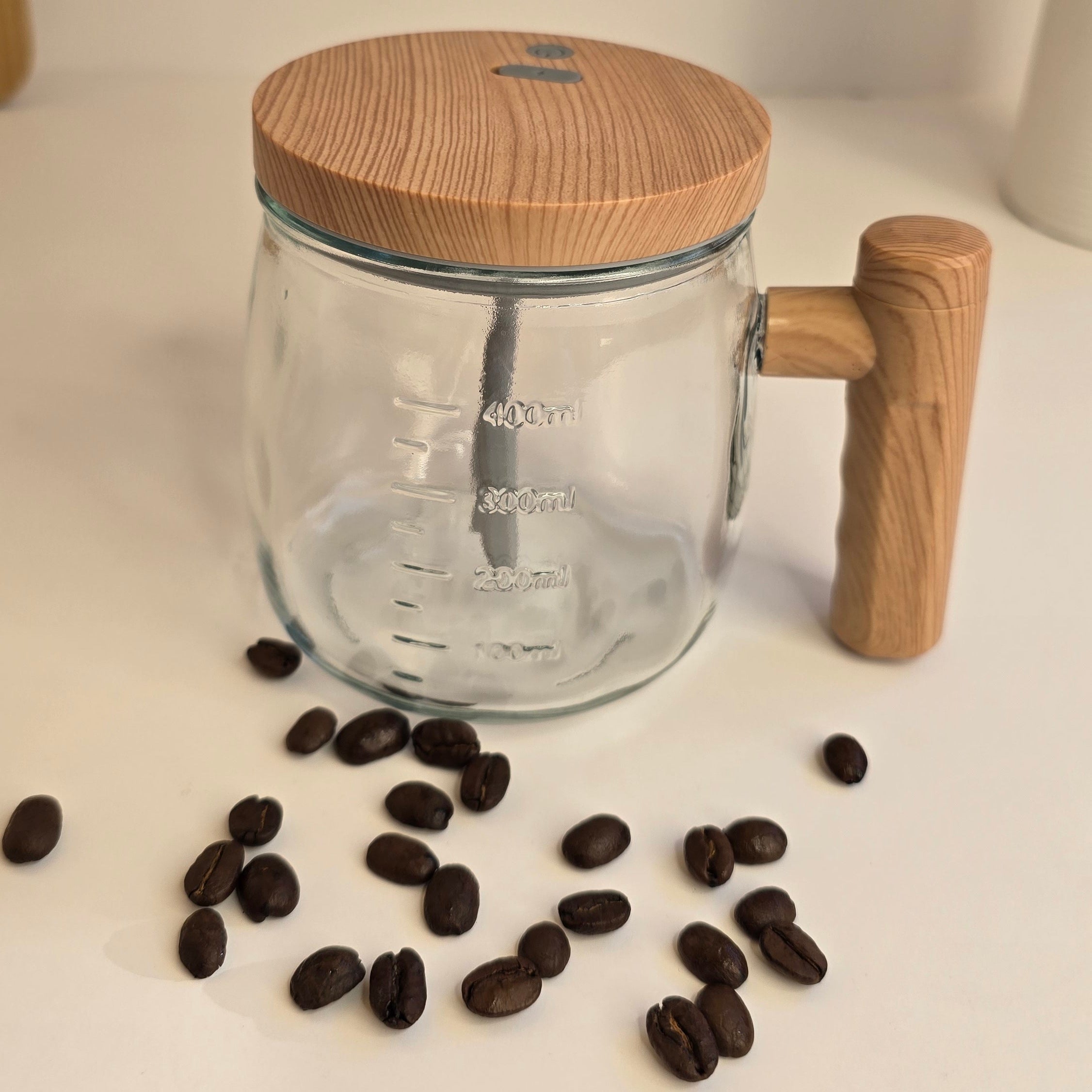 Beiryta electric milk frother with bamboo lid and elegant storage container.