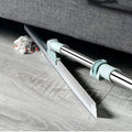 Beiryta rotating floor squeegee cleaning debris and dust from underneath a sofa.