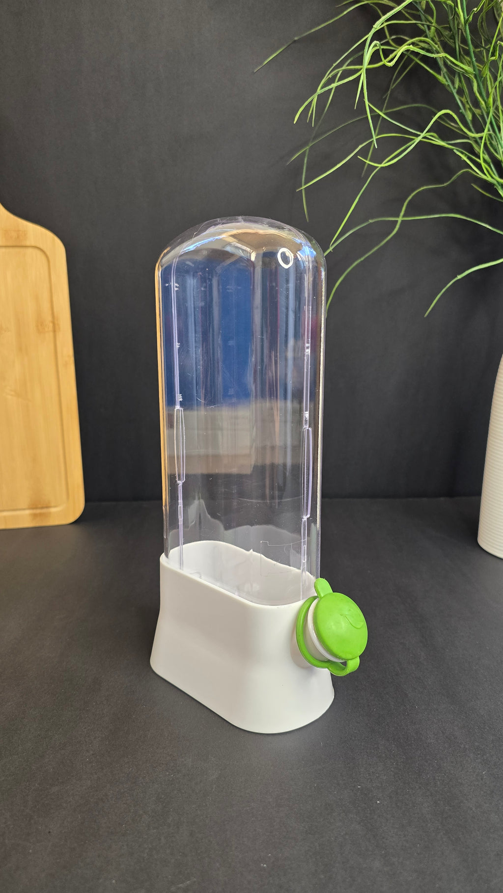 Angled view of the Beiryta herb keeper with white base and green refill cap
