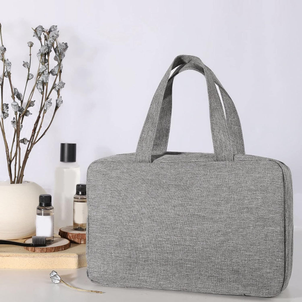 Beiryta hanging travel organizer bag with carry handles in a compact folded design.
