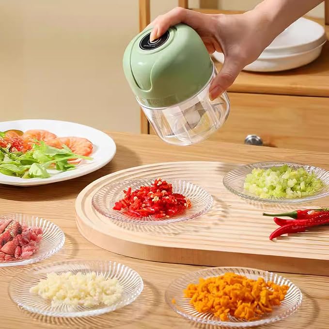 Beiryta rechargeable mini food chopper pouring freshly chopped ingredients into a bowl