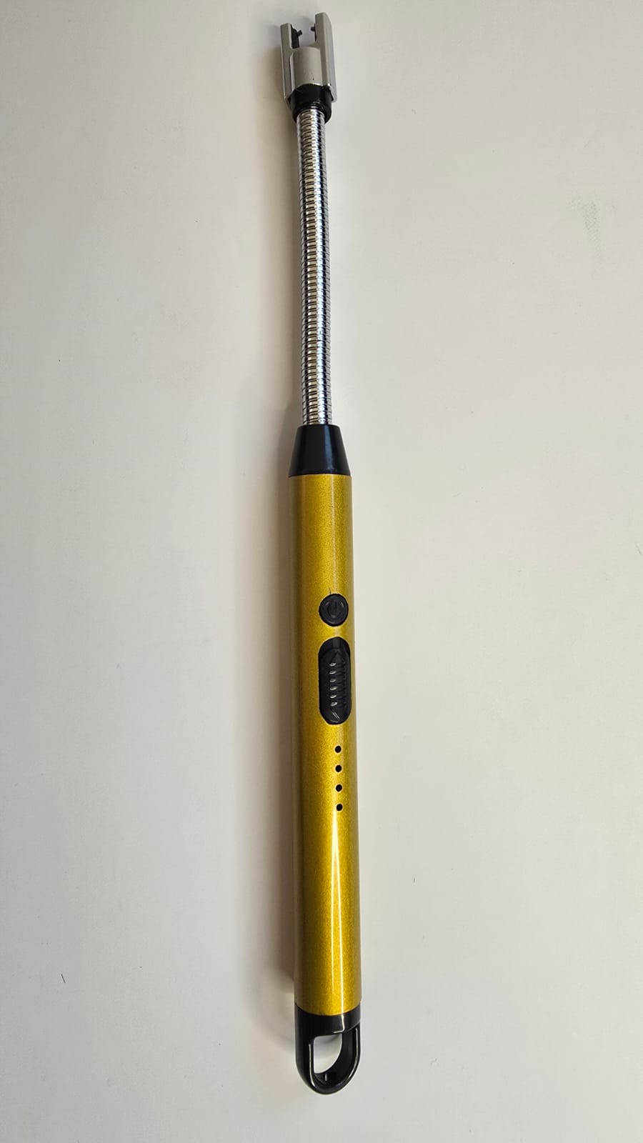 A handheld electric lighter with a metallic gold handle, black accents, and a flexible silver metal neck, shown against a plain off-white background.