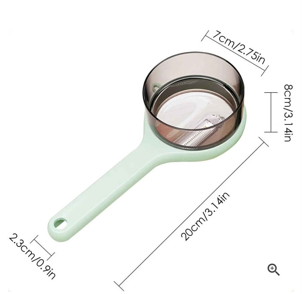 Beiryta vegetable peeler with its collector cover removed to show the metal peeling blade