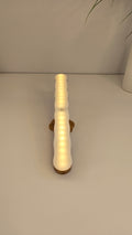 Front view of the Beiryta rechargeable warm LED night light illuminated on its wood-effect stand