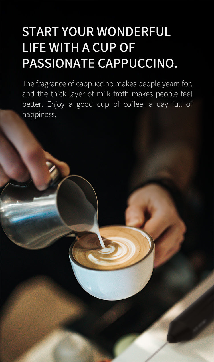 Barista pouring frothed milk into a cappuccino