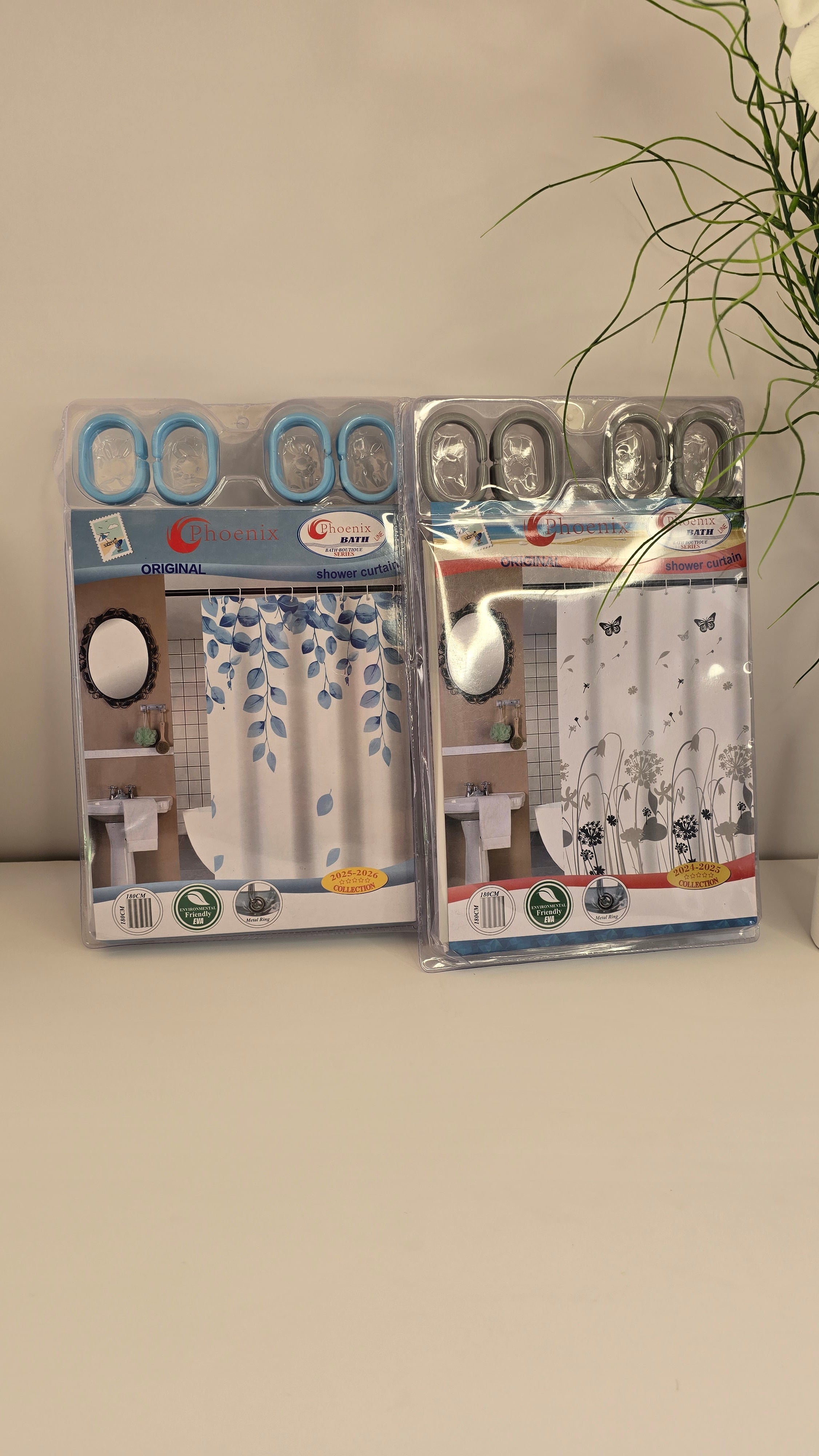 Selection of Phoenix EVA shower curtain designs with coordinating metal rings
