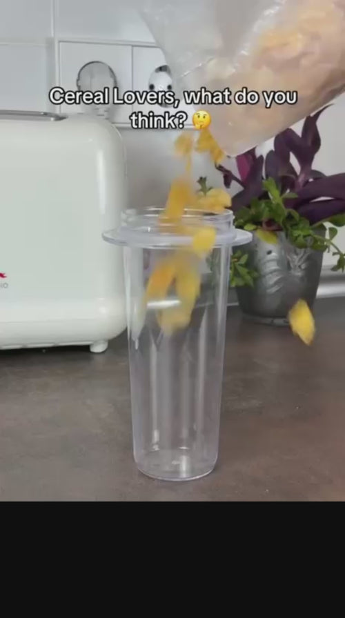 Portable cereal and milk cup keeping cereal separate and crunchy while drinking on the go