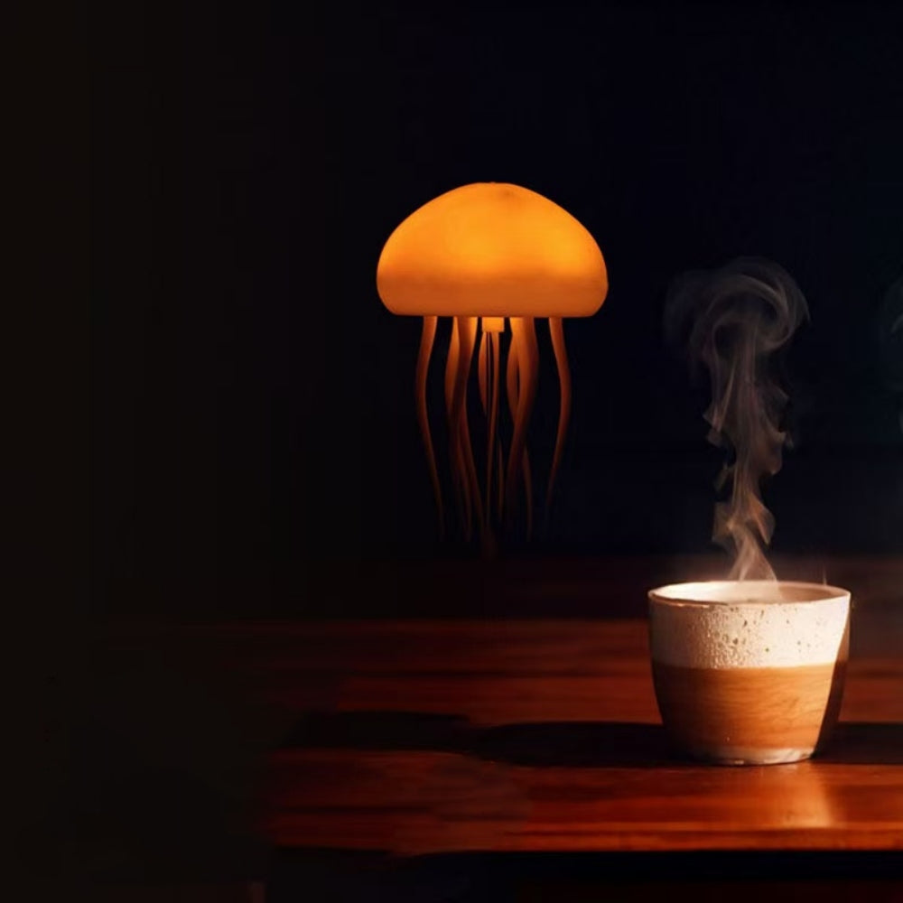Mushroom-shaped lamp emitting a warm glow next to a steaming cup on a dark background